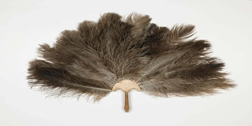 Ancient Egyptian fan handle with Hathor terminal, used with ostrich feathers, British Museum